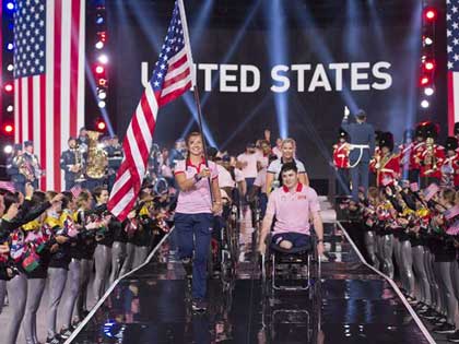 Air Force Capt. Christy Wise, U.S. team captain, carries the American flag as her team enters the opening ceremony for the 2017 Invictus Games at the Air Canada Centre in Toronto, Sept. 23, 2017. At right is team co-captain Marine Corps Sgt. Ivan Sears. The Invictus Games, established by Britain's Prince Harry in 2014, brings together wounded and injured veterans from 17 nations for 12 adaptive sporting events, including track and field, wheelchair basketball, wheelchair rugby, swimming, sitting volleyball and -- new to the 2017 games -- golf. DoD photo by Roger L. Wollenberg