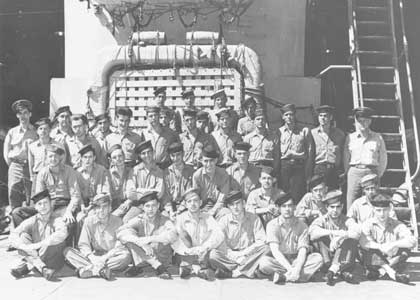 In this undated photo, members of the crew of USS Indianapolis (CA 35) pose in the well deck during World War II. The last major U.S. Navy ship sunk in the war 75 years ago, crew members of the cruiser left a legacy of a free and open Indo-Pacific. (U.S. Navy photo)