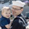 Machinist’s Mate 2nd Class Caleb Cruse, currently assigned to amphibious transport dock ship USS Portland (LPD 27), embraces his son following the ship's return. Portland, a part of the Essex Amphibious Ready Group, returned to Naval Base San Diego March 4 after a deployment to U.S. 3rd, 5th, and 7th Fleets in support of regional stability and a free and open Indo-Pacific. U.S. Navy photo by Mass Communication Specialist 2nd Class Jacob D. Bergh.