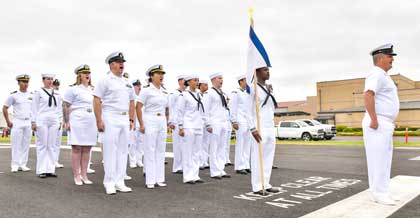 NAVAL BASE CORONADO (May 17, 2024) - Sailors assigned to Unmanned Surface Vessel Squadron 3 (USVRON 3) stand in formation and shout the command motto during the unit's establishment ceremony on Naval Amphibious Base Coronado May 17, 2024. The squadron is comprised of Global Autonomous Reconnaissance Crafts (GARCs). The 16-foot GARCs built by Maritime Applied Physics Corporation enable research, testing, and operations that will allow integration throughout the surface, expeditionary, and joint maritime forces. U.S. Navy photo by MC1 Claire M. DuBois.